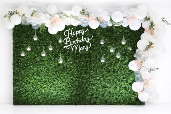 BOXWOOD WALL WITH BALLOONS AND MONOGRAM