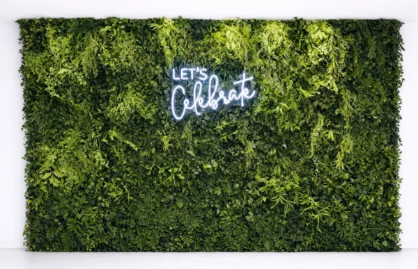 GREEN VEGETATION WALL AND NEON SIGN